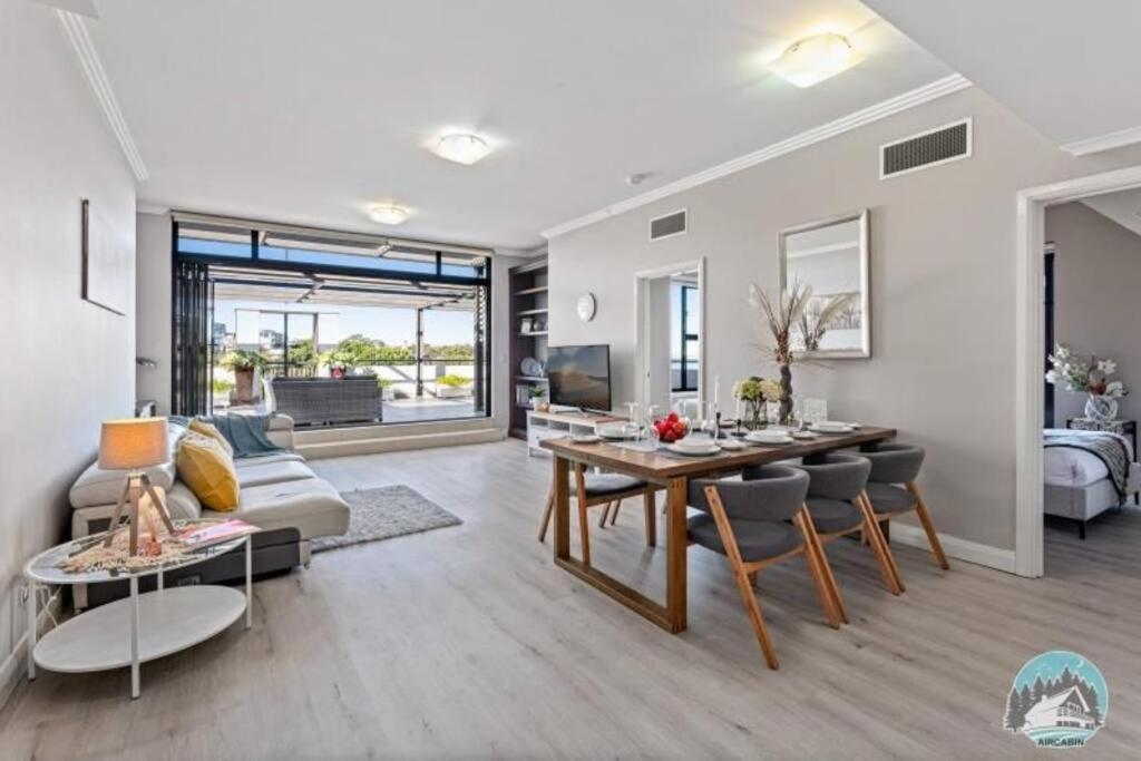 Breathtaking Waterfront Penthouse With Bigterrace Near To Olympic Park Apartment Sydney